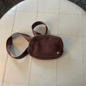 Brown fuzzy lululemon belt bag